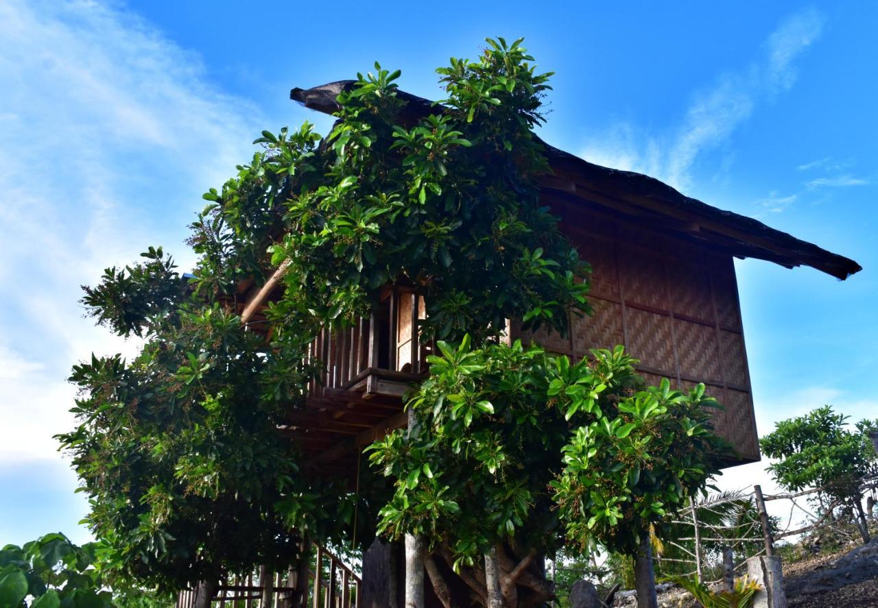 Kamp Aninipot Hotel Siquijor Bagian luar foto